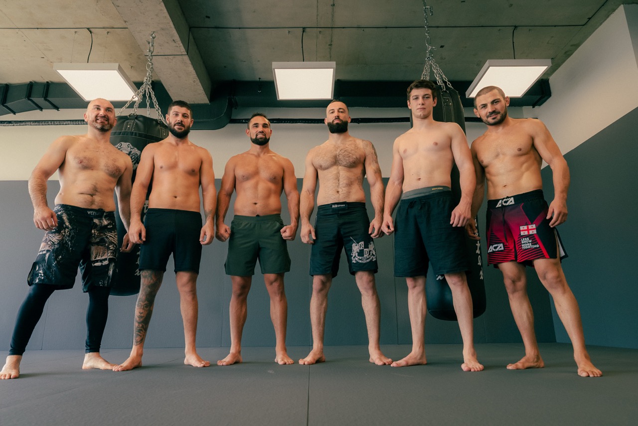 Coach-led MMA group training together at Gymnasia