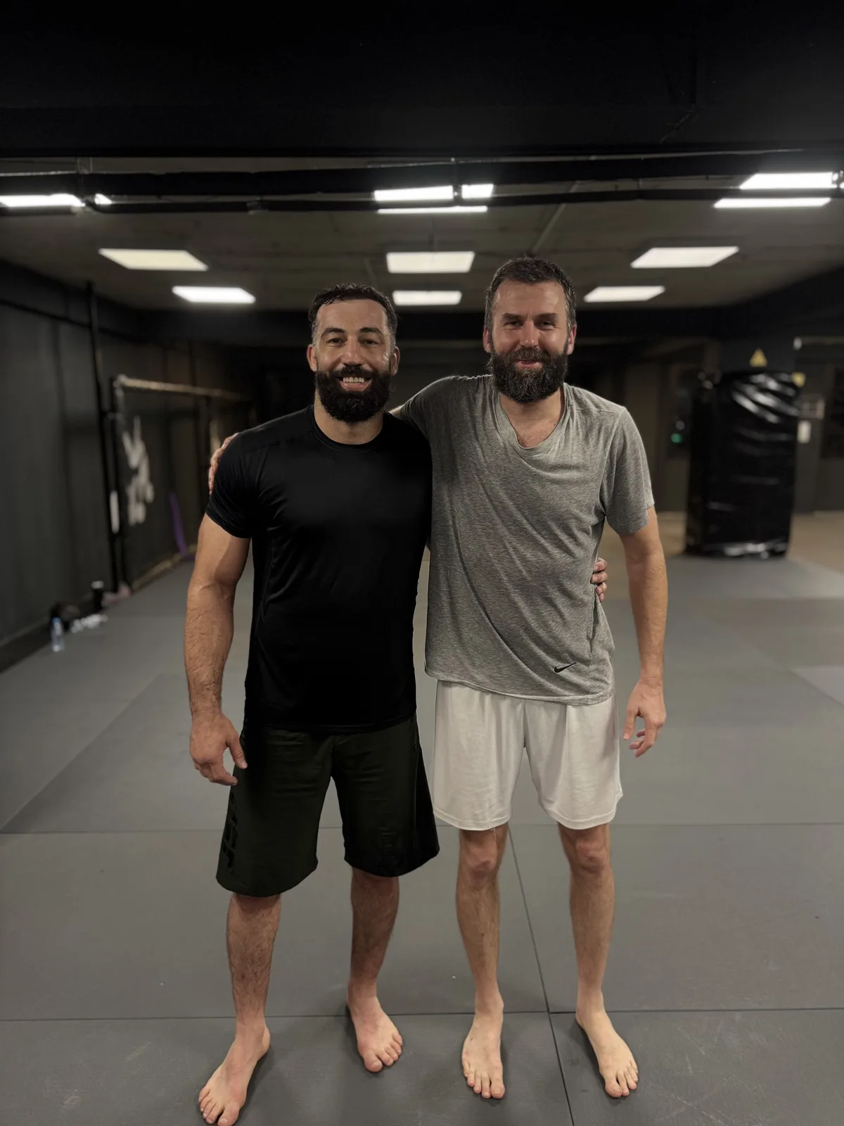 משתתפי המחנה — Archive photo of two training partners on the mat